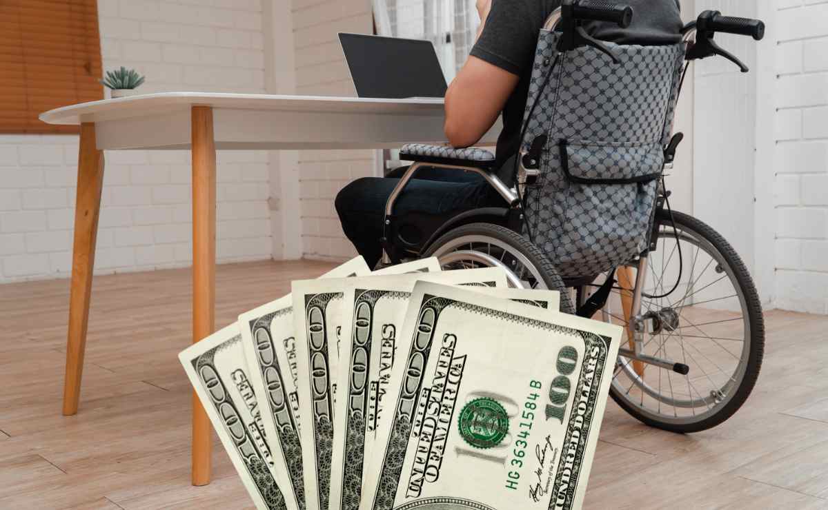 PErson with a disability and dollars because disability benefits will soon arrive for thousands of beneficiaries in the USA