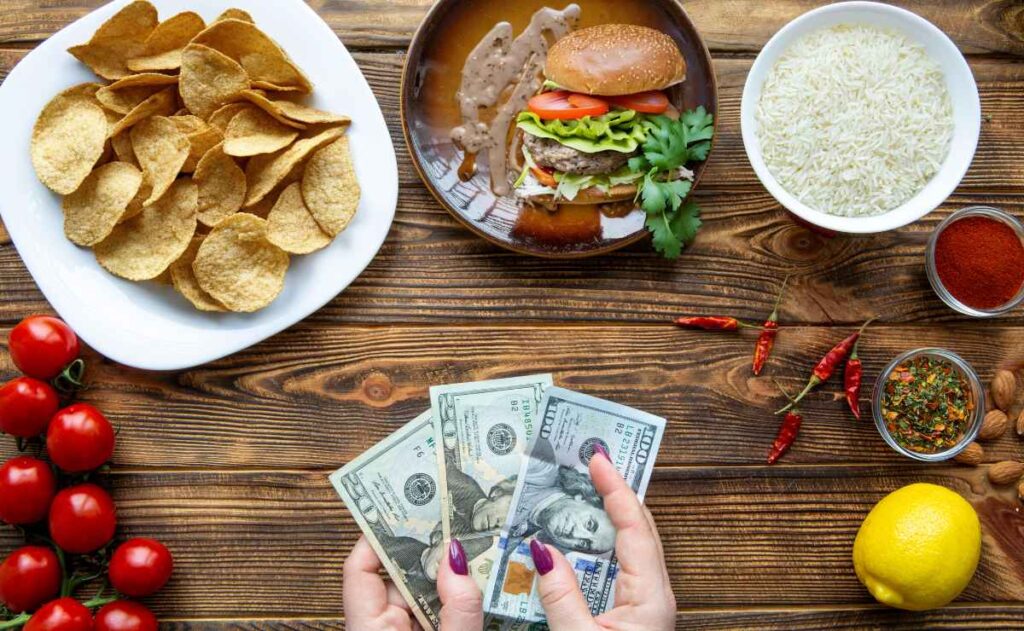 Food and hand with dollars to talk about Food Stamps (SNAP) payments in Florida and Texas