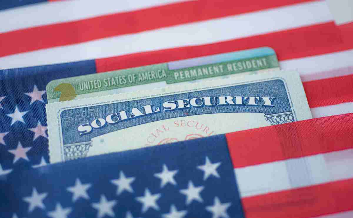 SSA card and US flag to talk about Social Security usually sends SSI on the first day of the month, but on the weekend or holiday