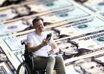 Person with a disability and dollars for SSDI and the new amounts for disability benefits