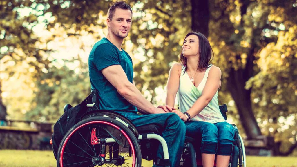 Couple with a disability to talk about the fact that SSDI beneficiaries will get a 2024 COLA increase in their payments will be higher