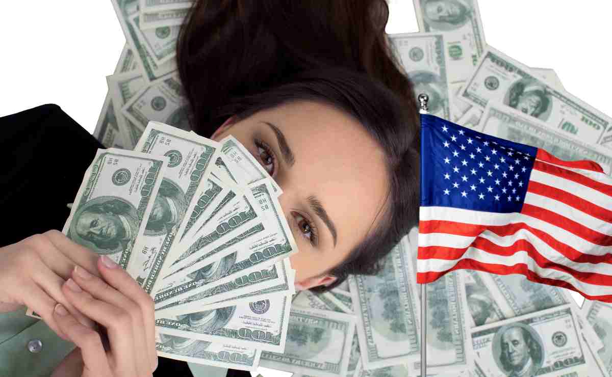 Woman with dollars and USa flag to see if you will receive money from a stimulus check in November