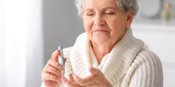 What is the normal glucose level in an adult person according to age